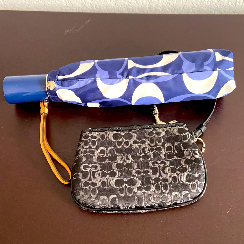Coach umbrella and wrist wallet black . New with out tag.
